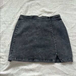 Distressed denim black mini skirt